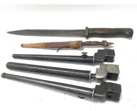 Three short stick socket bayonet one 1907 short bayonet and a small Middle Eastern knife.