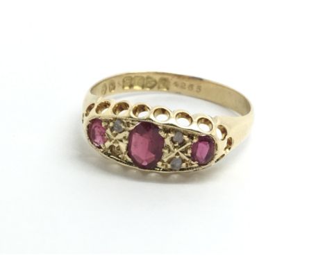 A vintage 18ct yellow gold, ruby and diamond ring, size approx O