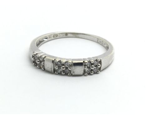 A 9ct white gold and diamond ring, approx 0.12ct, ring size approx L/M