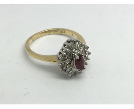 An 18ct gold diamind and ruby cluster ring, approx 4.7g and approx size N.