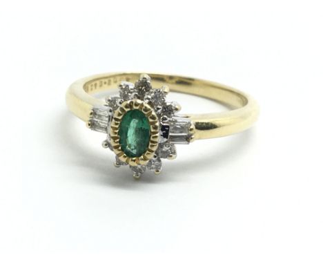 An 18ct yellow gold, diamond and emerald cluster ring, size approx O/P