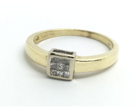 An 18ct yellow gold ring set with nine princess cut diamonds, approx 0.25ct, ring size approx T