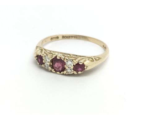 A 1950’s 9ct yellow gold ruby and diamond ring, size approx K