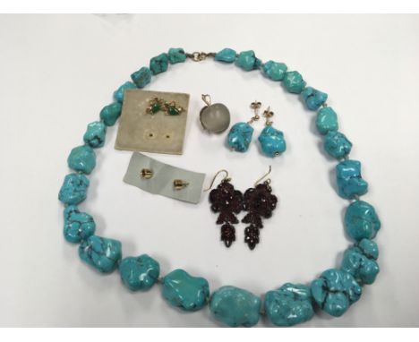 A Turquoise Polished Stone necklace With matching earrings a pair of jade set gold earrings and other jewellery.