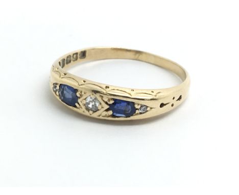 A vintage 18ct yellow gold, diamond and sapphire ring, size approx O/P