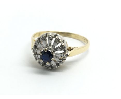 An 18ct yellow gold 1930s sapphire and diamond ring, approx size M