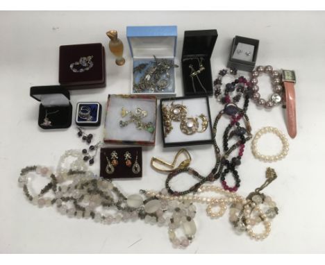 A collection of costume jewellery, a Burberry silk scarf and one other.