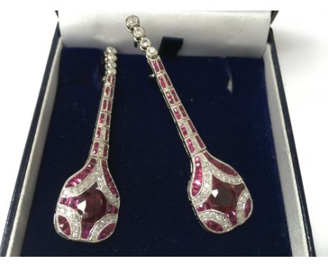 A pair of platinum Art Deco style ruby and diamond drop earrings, boxed. Rubies 4.50ct, approx. Diamonds 0.95ct approx