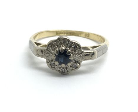 An 18ct yellow gold 1930â€™s sapphire and diamond cluster ring, size approx I/J