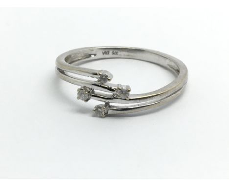 A 9ct white gold and diamond ring, approx 0.25ct, ring size approx M/N