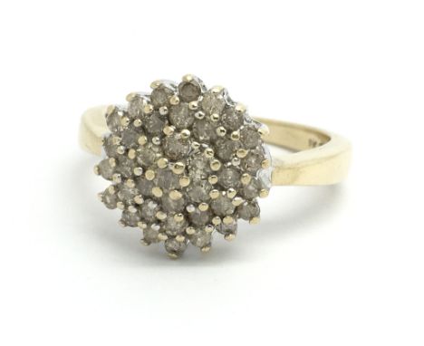 A 9ct yellow gold and diamond cluster ring, approx 0.66ct, ring size approx S/T