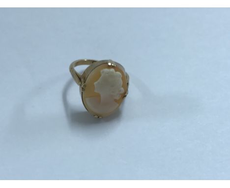 A 9 ct gold ring inset with cameo size k total weight 3 grams.