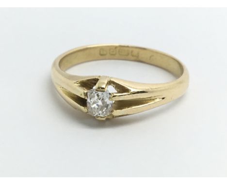 An 18ct yellow gold gents gypsy style ring set with central old cut diamond, approx size O/P