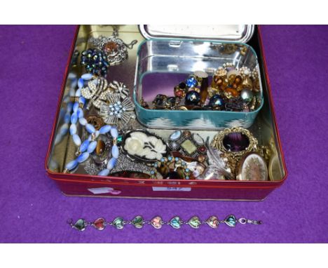 A selection of costume jewellery brooches, earrings and pendants including enamelled, Royal Navy, ceramic etc