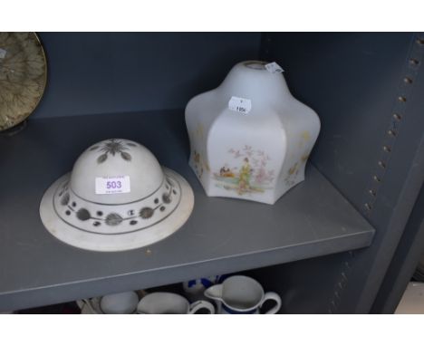 Two glass lamp shades or similar one having etched motif pattern.