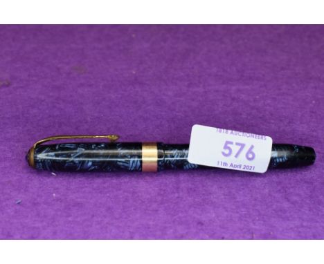 A Conway Stewart 27 leverfill fountain pen in blue marble with broad single gold band to cap