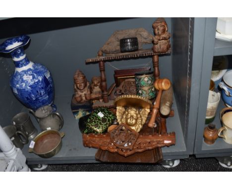 A collection of vintage treen including boxes, rolling pin and intricately carved items.