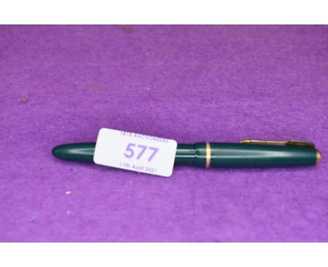 A Parker Slimfold vacuum fill fountain pen in forest green with single narrow decorative band to the cap