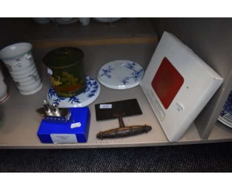 A selection of kitchen wares including teapot stands and herb cutter