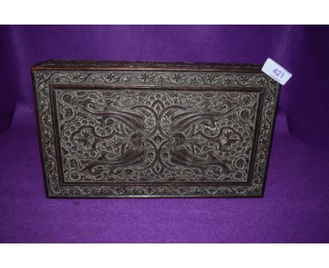 An intricate and finely carved humidor jewellery or trinket case with Bohemian or Black forest influence 30cm long 18cm wide 