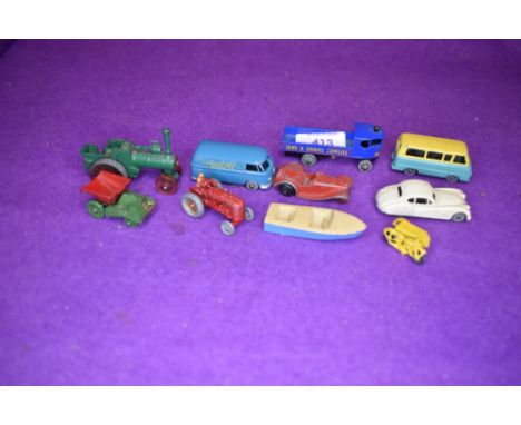 A selection of model toy vehicles by Lesney including boat tractor and van