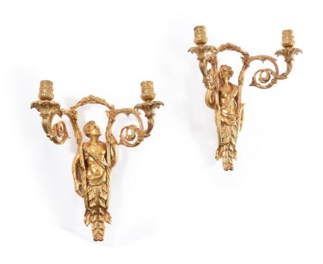 A PAIR OF FRENCH ORMOLU BACCHUS AND CARYATID TWIN-LIGHT WALL APPLIQUES  19TH CENTURY  Modelled as opposing figures supporting