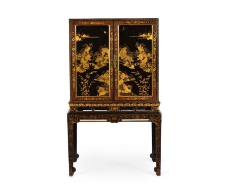 A CHINESE EXPORT LACQUER CABINET ON STANDLATE 18TH/EARLY 19TH CENTURYThe doors enclosing a stepped arrangement of architectur