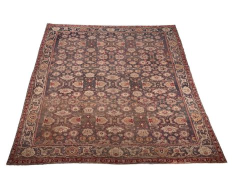 AN AGRA CARPET approximately 410 x 360cm Condition Report: Wear to carpet overall. Overall there are various areas of re-wove