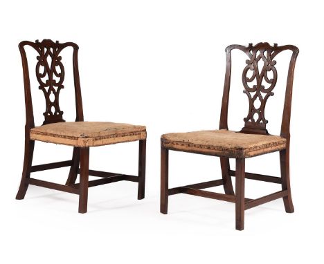 A PAIR OF GEORGE II MAHOGANY SIDE CHAIRS IN THE MANNER OF THOMAS CHIPPENDALE, CIRCA 1750each 99cm high, 57cm wide, 61cm deep 