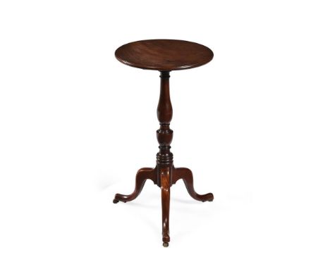 AN EARLY GEORGE III MAHOGANY TRIPOD TABLECIRCA 1765 On brass castors 71cm high, the top 37.5cm diameter Condition Report: Mar