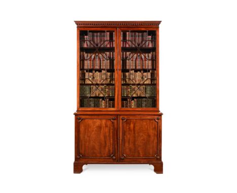 A GEORGE III MAHOGANY CABINET BOOKCASEIN THE MANNER OF HENRY KETTLE, CIRCA 1770The lower cupboard section opening to three sl