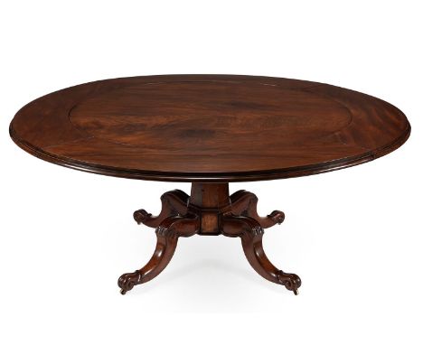 A WILLIAM IV MAHOGANY CIRCULAR CONCENTRIC EXTENDING DINING TABLE CIRCA 1835With four additional concentric leaf additions 80c
