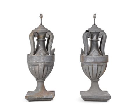 A PAIR OF FRENCH ZINC ROOF FINIALS PROBABLY LATE 19TH CENTURY Of four-handled baluster urn form, acroteria decorative mounts,