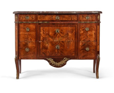 Y A SWEDISH SATINWOOD, TULIPWOOD CROSSBANDED, MARQUETRY AND GILT METAL MOUNTED COMMODE IN LOUIS XV/XVI TRANSITIONAL STYLE, LA