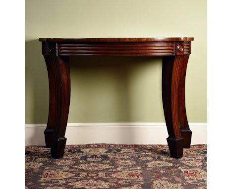 A REGENCY SERPENTINE MAHOGANY SIDE TABLEIN THE MANNER OF MARSH & TATHAM, CIRCA 1820 99cm high, 139cm wide, 57.5cm deepThe arc