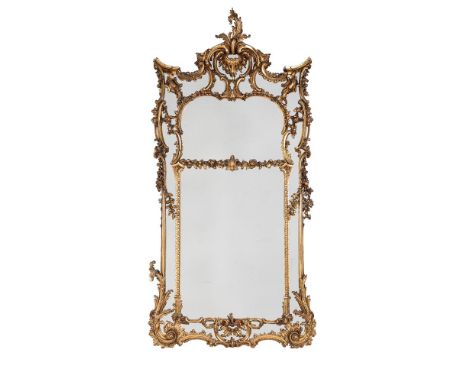 A LARGE CARVED GILTWOOD WALL MIRRORIN GEORGE III STYLE, 19TH CENTURY240cm high, 122cm wideProvenance: Private collection remo