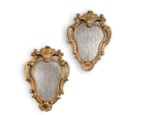 A PAIR OF NORTH ITALIAN GILTWOOD WALL MIRRORSPOSSIBLY GENOA, 18TH CENTURYeach 86cm high, 60.5cm wideCondition Report: There a