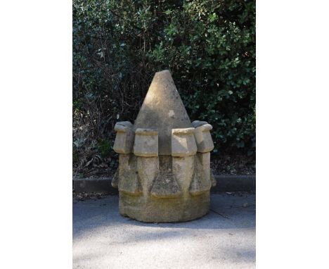 AN UNUSUAL SCULPTED STONE ARCHITECTURAL FINIALLATE 19TH/EARLY 20TH CENTURYOf pointed castellated tapering form,92cm high, 58c