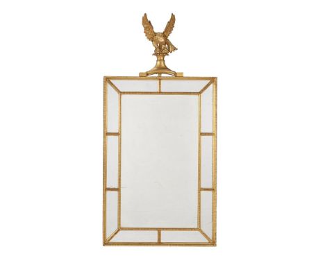 A GEORGE III GILTWOOD WALL MIRROR CIRCA 1790With carved giltwood eagle surmount and divided peripheral plates 130cm high, 65c