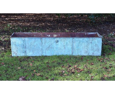 A LARGE VERDIGRIS PATINATED COPPER TROUGH  20TH CENTURY  Of rectangular outline, with central lion mask detail above oval pla
