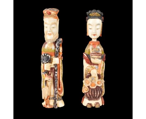 Pair of Japanese Polychrome Carved Ivory Figural Snuff Bottles. Depicting male and female figures. Unsigned. Measures 5-1/4" 