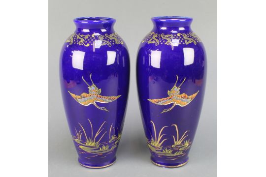 A Pair Of Empire Ware Blue Ground Oviform Vases Decorated With