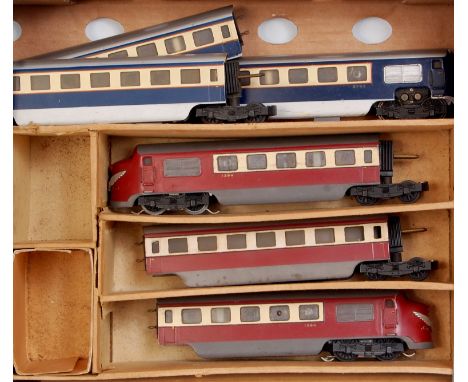 A Twix Twin Railway 3 car Meteor diesel express red/cream in poor box (G-BP) and a similar 3 car in blue/cream good for age (
