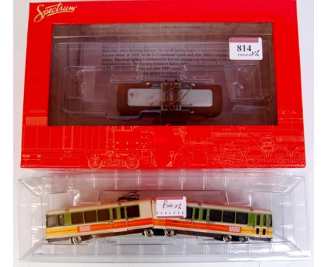 A Bachmann Spectrum HO Peter Watt street car (G-BG) together with and articulated tram car of continental outline (G)