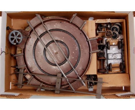 A tray of GI clockwork items including 2x R/H 2ft radius points, 2x turntables, 2x 4 wheel bogies and 10 axles each with 2 wh