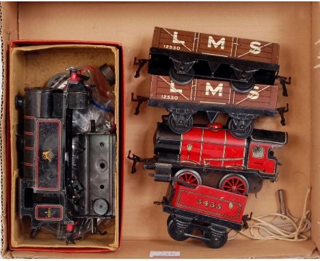 A Hornby postwar clockwork M1 engine and tender, 3435 red, with key and 2 LMS wagons (F-G), together with a no. 40 tank loco,