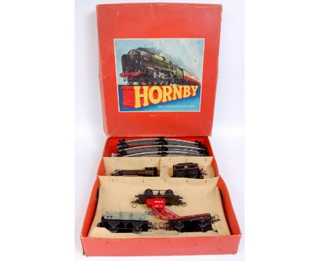 A Hornby No. 50 goods set box containing black clockwork 0-4-0 engine and tender, 3 wagons, may not be correct for set, track