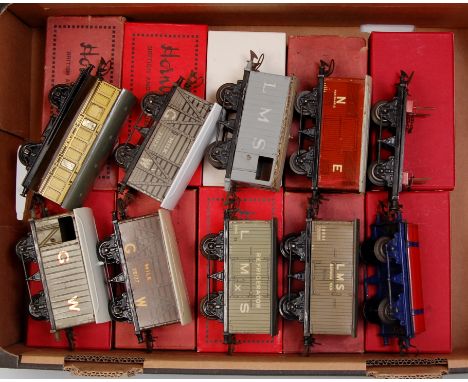 A large tray containing 9 prewar Hornby wagons including 1933-9 Gas Cylinder Wagon (F), 1939-41 No. 1 Lumber Wagon (F), 1937-