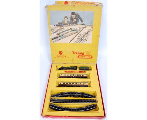 A Triang T6 TT gauge train set containing 'Windsor Castle' engine and tender, 2 brown/cream coaches, B series track oval, con
