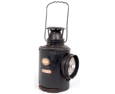 An Adlake non-sweating signal lamp, brass plated LMS railway and 'Habrough'